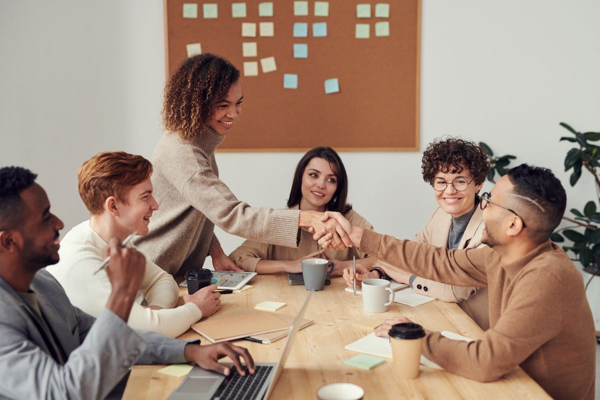 Small business team meeting where AI deployment decisions get made
