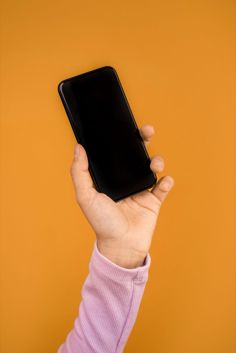 Smartphone showing social media apps where link-in-bio traffic originates